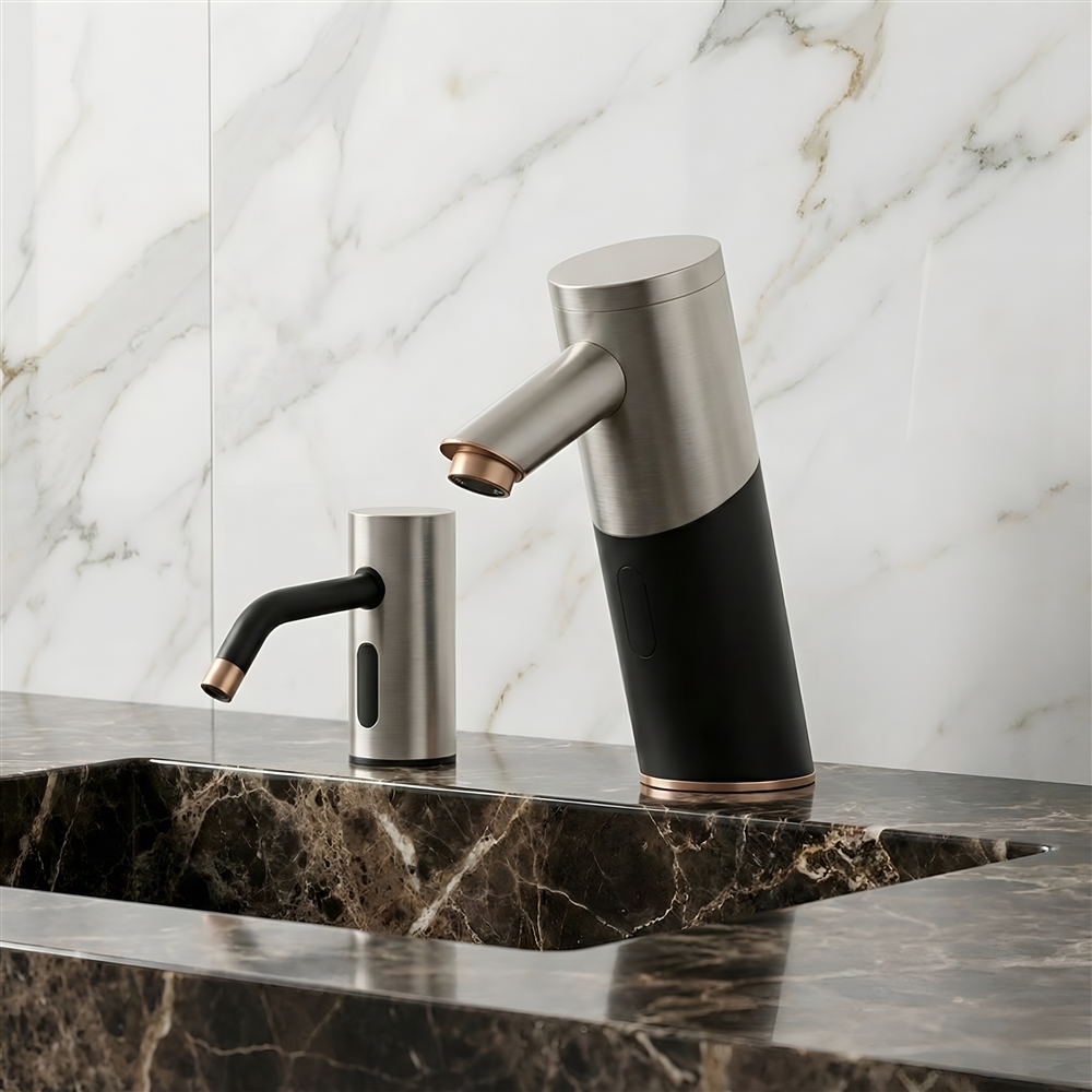 Close-up of chrome sensor faucet running water in a commercial sink